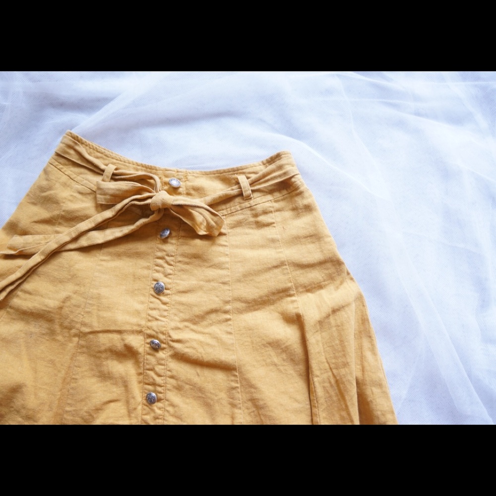 CLOSING mustard yellow button up skirt